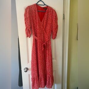 Brand new with tags, floral dress with slit.
